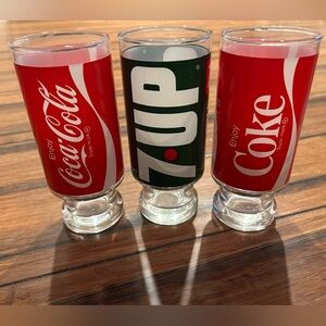 Lot of 3 vintage 16oz glasses. One 7up & Two Coca-Cola. Excellent condition.